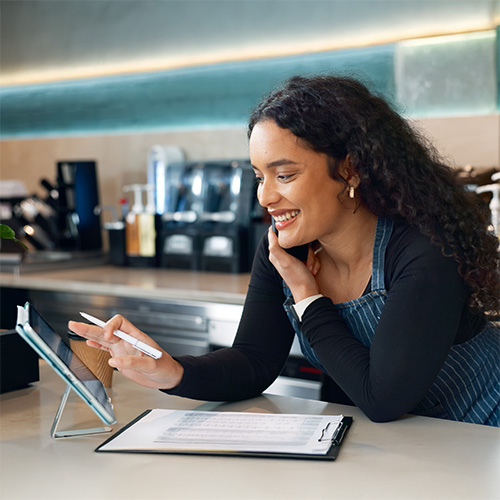 tablet happy woman phone call cafe order